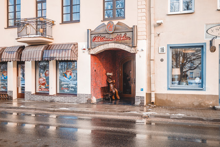 Vilnius, Lithuania - December 27, 2017: People walk along street, popular place of walks and tourist route with scenic city views, numerous attractions, cafes, souvenir shops in Vilniusのeditorial素材