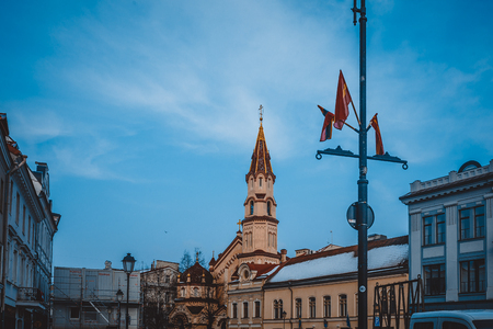 Vilnius, Lithuania - December 27, 2017: People walk along street, popular place of walks and tourist route with scenic city views, numerous attractions, cafes, souvenir shops in Vilniusのeditorial素材