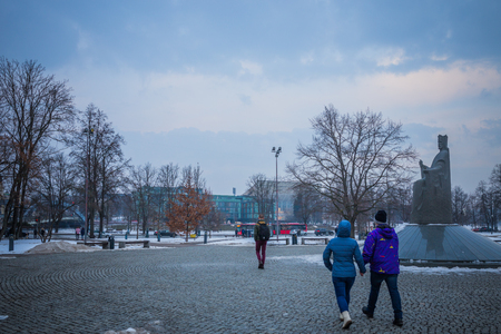 Vilnius, Lithuania - December 27, 2017: People walk along street, popular place of walks and tourist route with scenic city views, numerous attractions, cafes, souvenir shops in Vilniusのeditorial素材