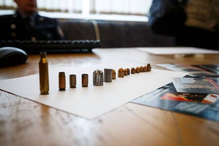 many shell casings from bullets of different caliberの写真素材