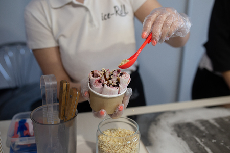 Thai fried rolled ice cream on the street marketの写真素材