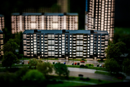 model of residential quarter with houses and carsの写真素材