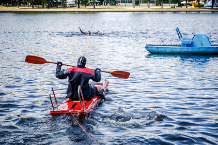 Rescuers rush to help a sinking personの写真素材