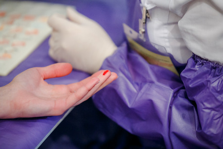Taking blood for close-up analysis, a clinical blood testの写真素材