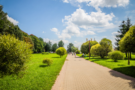 green park in the center of the city in bright sunny weather