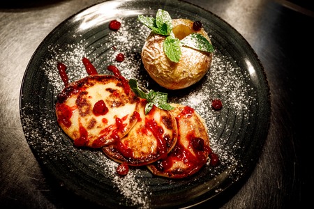 Baked apple with cottage cheese pancakesの写真素材