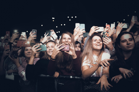 MINSK, BELARUS - 20 SEPTEMBER, 2018: Crowd at concert - retro style photoのeditorial素材