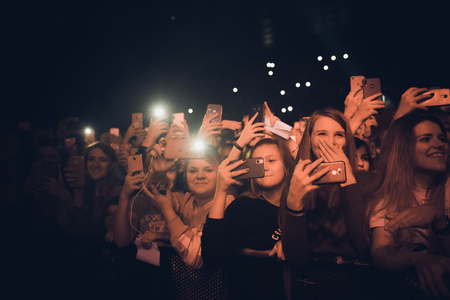 MINSK, BELARUS - 20 SEPTEMBER, 2018: Crowd at concert - retro style photoのeditorial素材