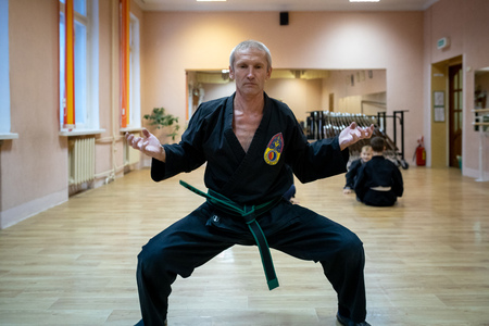 MINSK, BELARUS - 25 DECEMBER, 2018: children train with martial arts trainer viet daoのeditorial素材