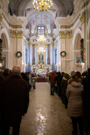 MINSK, BELARUS - 25 DECEMBER, 2018: church service in front of crowd in the interior of a churchのeditorial素材