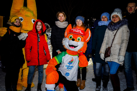MINSK, BELARUS - 20 JANUARY, 2018: the mascot of the II European games fox Lesik is photographed with adults and childrenのeditorial素材