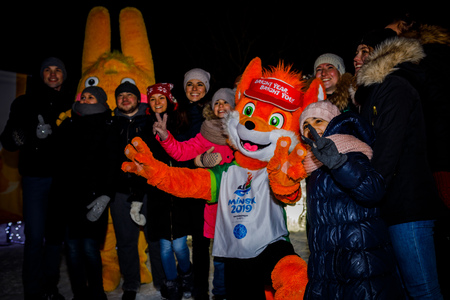 MINSK, BELARUS - 20 JANUARY, 2018: the mascot of the II European games fox Lesik is photographed with adults and childrenのeditorial素材