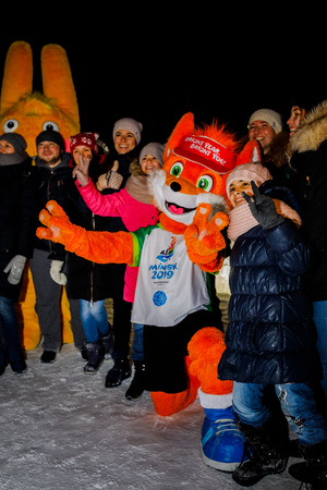 MINSK, BELARUS - 20 JANUARY, 2018: the mascot of the II European games fox Lesik is photographed with adults and childrenのeditorial素材