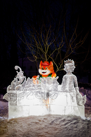 MINSK, BELARUS - 20 JANUARY, 2018: the mascot of the II European games fox Lesik is photographed with adults and childrenのeditorial素材