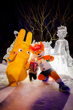 MINSK, BELARUS - 20 JANUARY, 2018: the mascot of the II European games fox Lesik is photographed with adults and childrenのeditorial素材