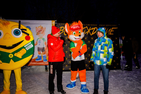 MINSK, BELARUS - 20 JANUARY, 2018: the mascot of the II European games fox Lesik is photographed with adults and childrenのeditorial素材