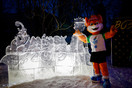 MINSK, BELARUS - 20 JANUARY, 2018: the mascot of the II European games fox Lesik is photographed with adults and childrenのeditorial素材