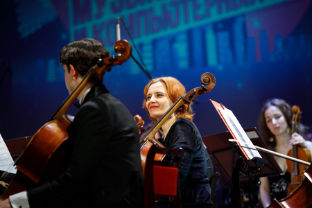 MINSK, BELARUS - 1 APRIL, 2019: Conductor directing symphony orchestraのeditorial素材