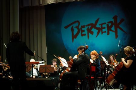 MINSK, BELARUS - 1 APRIL, 2019: Conductor directing symphony orchestraのeditorial素材