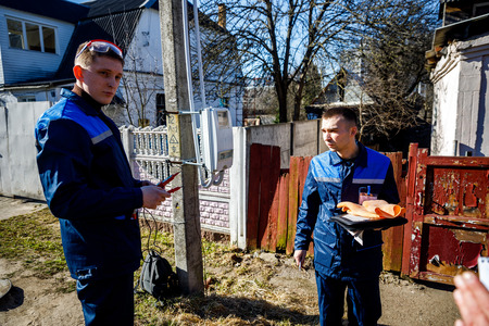 MINSK, BELARUS - 1 APRIL, 2019: electrician checks switchboardのeditorial素材