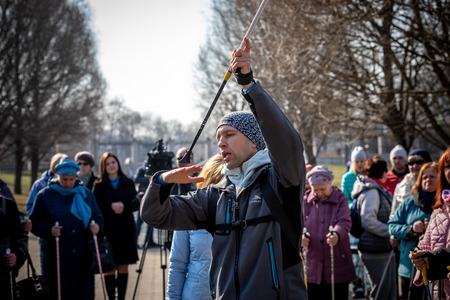 MINSK, BELARUS - 1 MARTH, 2019: older people doing Nordic walking exercisesのeditorial素材
