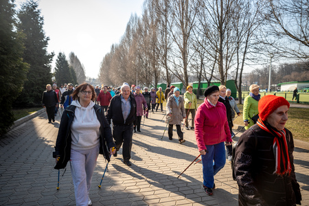 MINSK, BELARUS - 1 MARTH, 2019: older people doing Nordic walking exercisesのeditorial素材