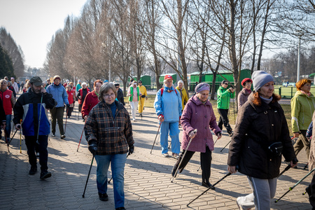 MINSK, BELARUS - 1 MARTH, 2019: older people doing Nordic walking exercisesのeditorial素材