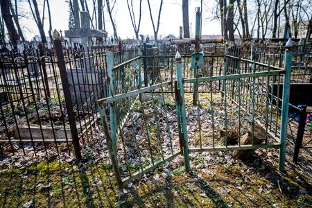 abandoned Orthodox cemetery in sunny spring weatherの写真素材
