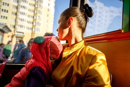 MINSK, BELARUS - 1 MAY, 2019: children ride the school busの写真素材