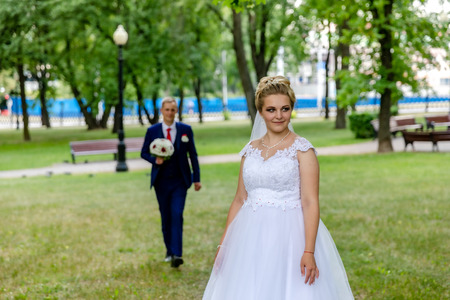 MINSK, BELARUS - 1 JUNE, 2019: beautiful couple in love newlywedsのeditorial素材