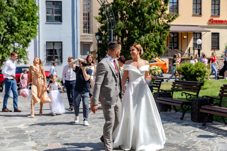 MINSK, BELARUS - 1 JUNE, 2019: beautiful couple in love newlywedsのeditorial素材