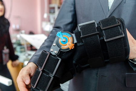 MINSK, BELARUS - 1 JUNE, 2019: surgeon holding prostheticのeditorial素材