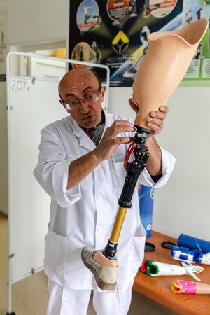 MINSK, BELARUS - 1 JUNE, 2019: surgeon holding prostheticのeditorial素材