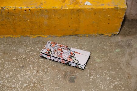 lost wallet is lying on the floorの写真素材