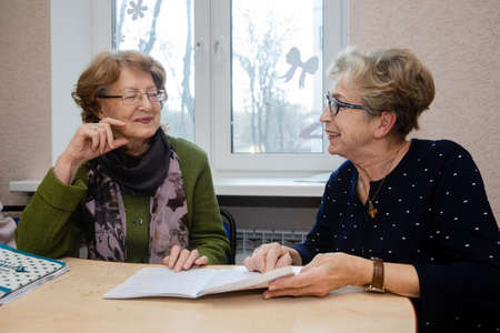 MINSK, BELARUS - February 25, 2020: older women learn English in a groupのeditorial素材