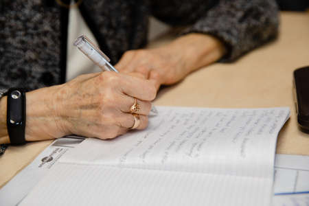 MINSK, BELARUS - February 25, 2020: older women learn English in a groupのeditorial素材