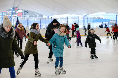 MINSK, BELARUS - February 25, 2020: people skate at the city rinkのeditorial素材