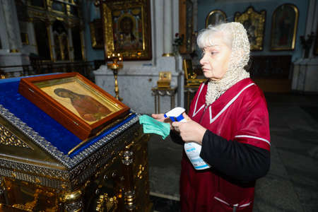 MINSK, BELARUS - February 25, 2020:  Coronavirus disinfection in an Orthodox churchのeditorial素材