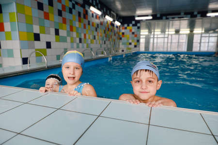 MINSK, BELARUS - February 25, 2020: children learn to swim in the poolのeditorial素材