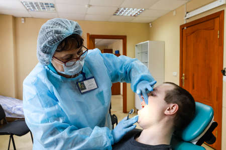 MINSK, BELARUS - 1 MARCH, 2020: draftees undergo a physical examination and go to serve in the army during the coronavirus pandemicのeditorial素材
