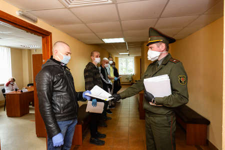 MINSK, BELARUS - 1 MARCH, 2020: draftees undergo a physical examination and go to serve in the army during the coronavirus pandemicのeditorial素材