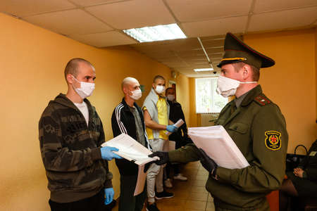 MINSK, BELARUS - 1 MARCH, 2020: draftees undergo a physical examination and go to serve in the army during the coronavirus pandemicのeditorial素材