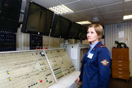 MINSK, BELARUS - 1 MARCH, 2020: Metro worker in uniform is on duty at the stationのeditorial素材