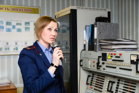 MINSK, BELARUS - 1 MARCH, 2020: Metro worker in uniform is on duty at the stationのeditorial素材