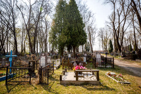 MINSK, BELARUS - 1 MAY, 2019: abandoned Orthodox cemetery in sunny spring weather