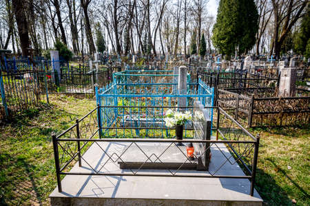 MINSK, BELARUS - 1 MAY, 2019: abandoned Orthodox cemetery in sunny spring weatherのeditorial素材