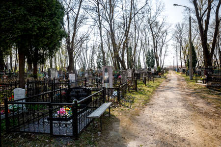 MINSK, BELARUS - 1 MAY, 2019: abandoned Orthodox cemetery in sunny spring weatherのeditorial素材
