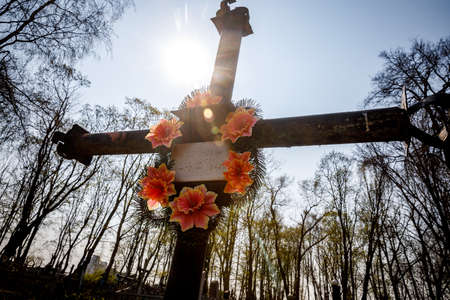 MINSK, BELARUS - 1 MAY, 2019: abandoned Orthodox cemetery in sunny spring weatherのeditorial素材