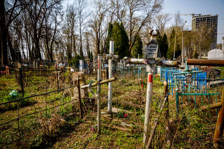 MINSK, BELARUS - 1 MAY, 2019: abandoned Orthodox cemetery in sunny spring weatherのeditorial素材