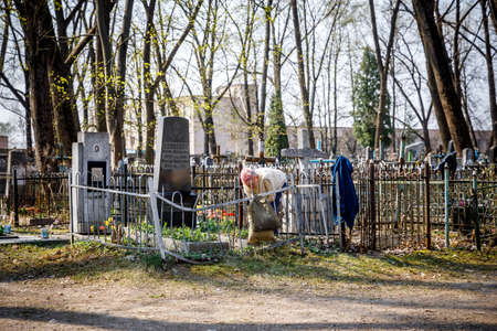 MINSK, BELARUS - 1 MAY, 2019: abandoned Orthodox cemetery in sunny spring weatherのeditorial素材